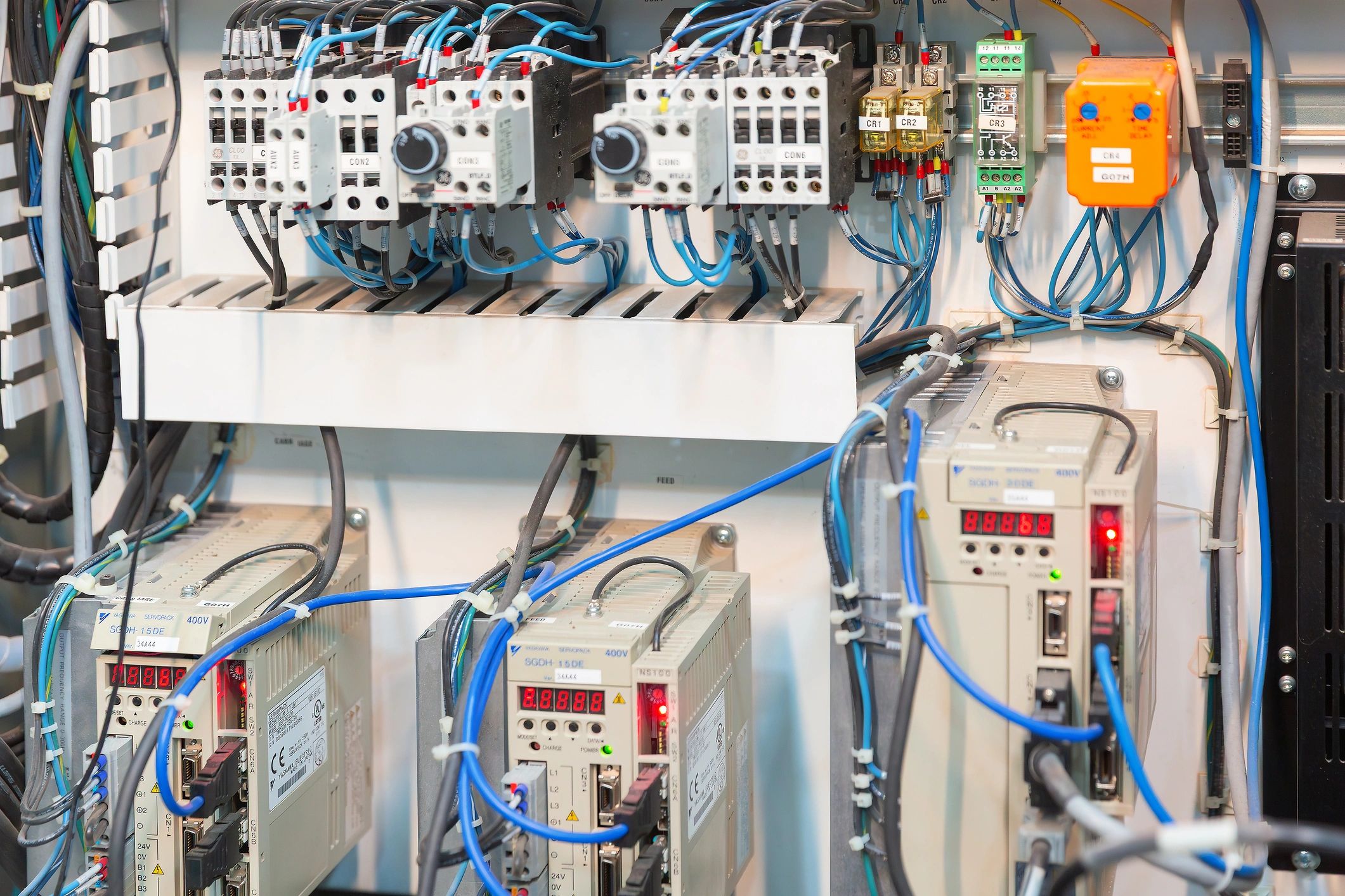 Industrial electrical control panel with neatly routed wiring and components
